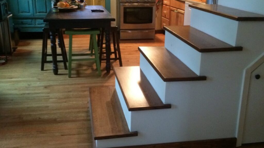 Beautiful finished hardwood floors and custom stairs completed by Burleson De Lago Real Hardwood Floors in Austin, TX.