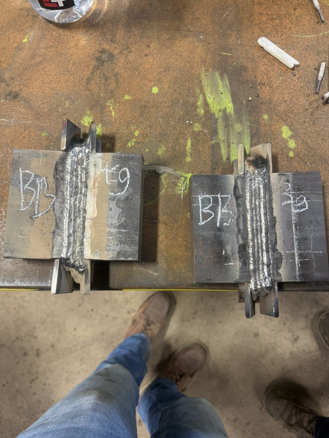 Finished metal welds on steel pieces by Siva Steel LLC, a handyman service in Saginaw, MI.