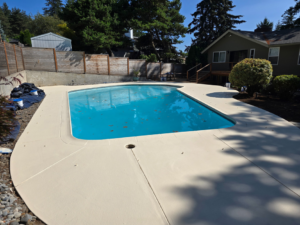 A view of the finished pool deck resurfacing project by Done Right Handy, providing handyman services in Wilmington, DE.