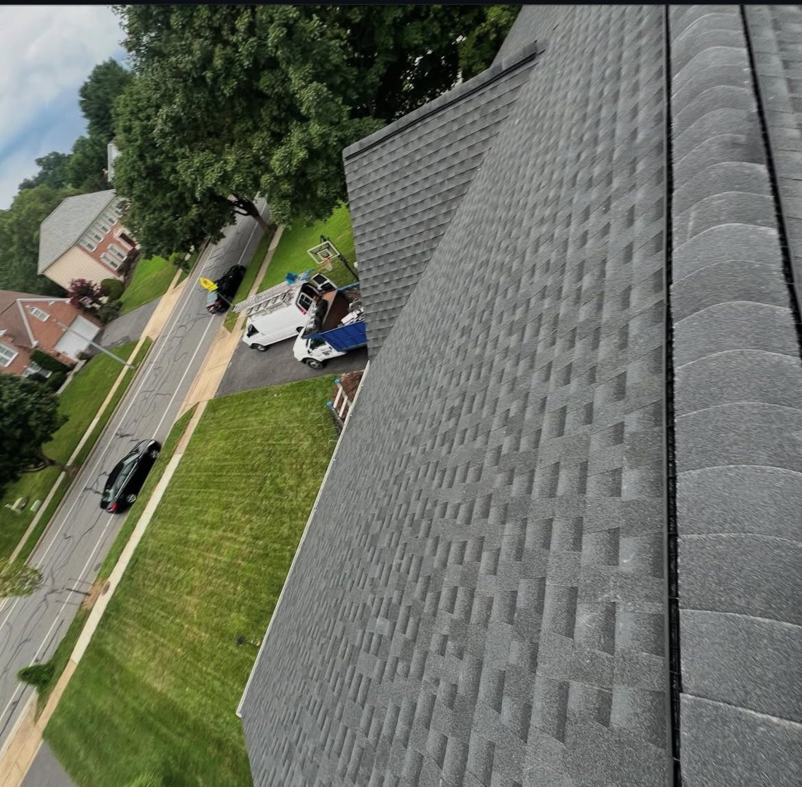 A wide view of a finished residential roof installation by Goldstone Contracting Inc. in Gambrills, MD.