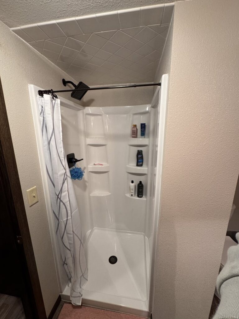 A newly installed and finished shower stall by Hawk Handyman Services in West Fargo, ND
