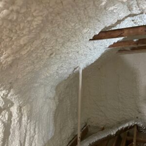 Close-up of newly applied spray foam insulation on an attic ceiling by Koala Insulation of Charlotte, NC