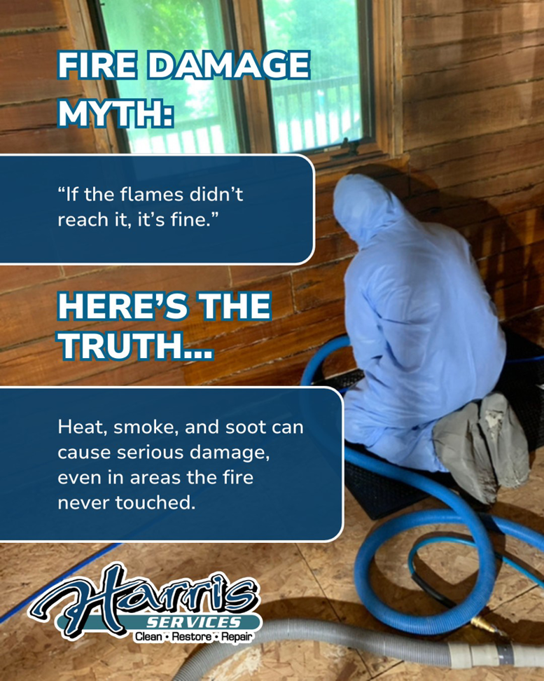 A worker in a hazmat suit performing fire damage restoration services for Harris Services in Bloomington, IN.