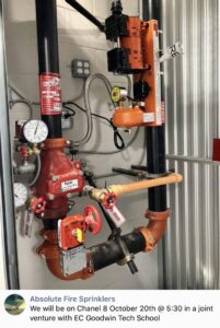 A complex fire sprinkler system riser with valves and pipes installed by Absolute Fire Sprinklers in Bristol, CT.
