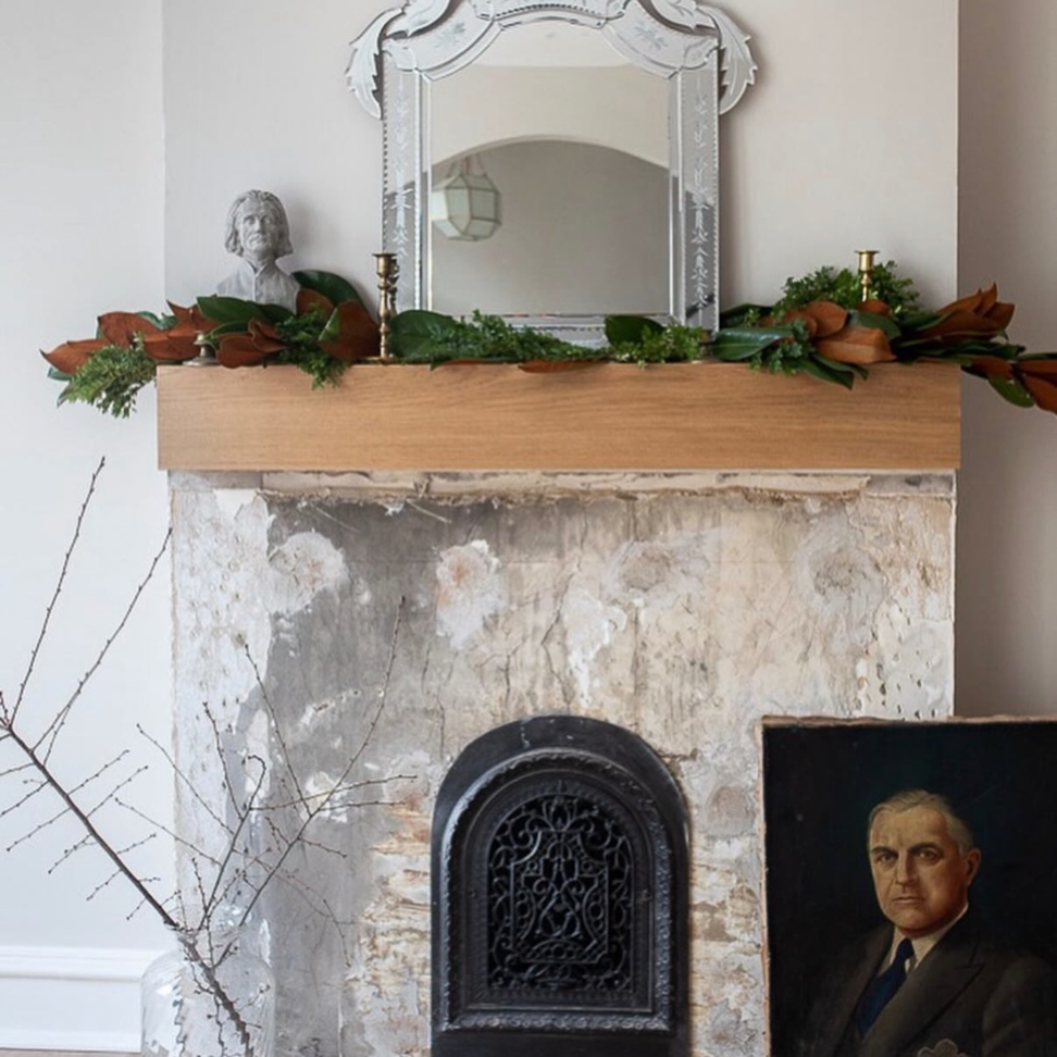 Fireplace restoration project featuring a new wooden mantel by Brentwood Builders Inc., your general contractor in Lancaster, PA.