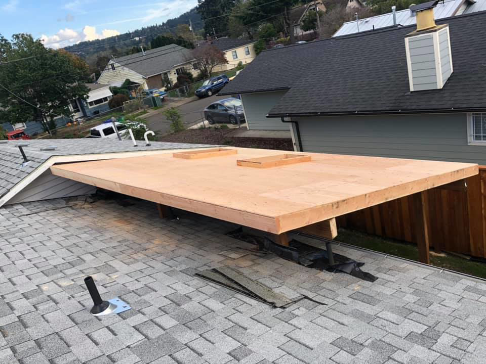 Flat roof extension decking installation by All in One Remodeling Services LLC in East Sandwich, MA