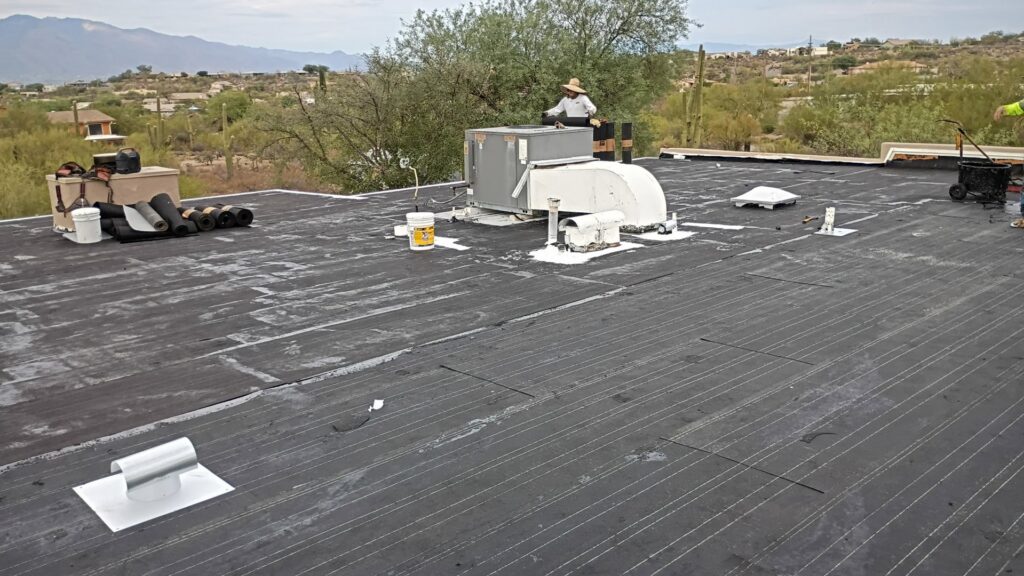 Flat roof preparation work in progress by Mayitos roofing LLC in Tucson, AZ.