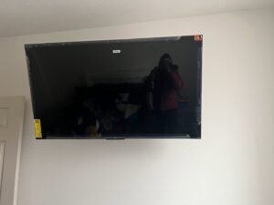 Professional flat-screen TV wall mounting service by JW Contracting Services, LLC in Dayton, OH.