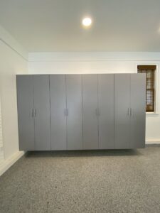 Modern floating garage cabinets installed by PremierGarage of Baltimore in Baltimore, MD.