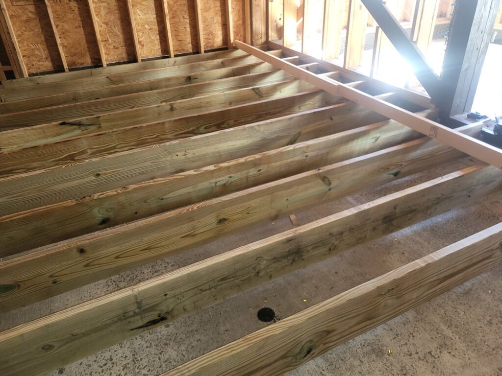 Floor joist installation for a new construction or renovation by Gladiator Flooring LLC in Summerville, SC.