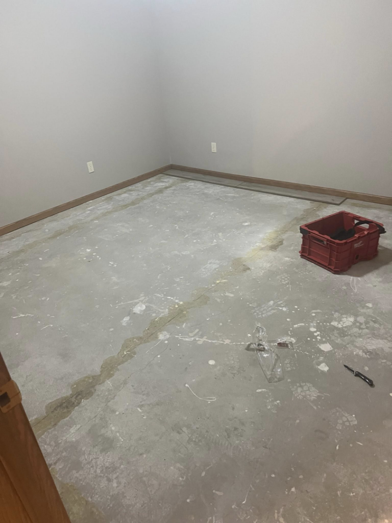 Concrete floor prepared for new flooring installation by Halls Home Solutions in Pierre, SD