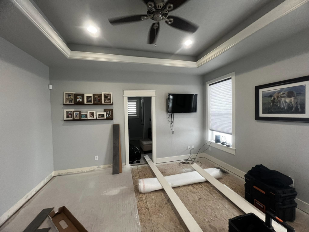 Flooring installation in progress with new materials and tools by E&D Lozano Handyman in Caldwell, ID.