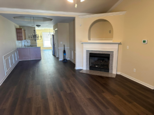New flooring, wainscoting, and fireplace surround installed by Parker Painting Company in Edmond, OK.