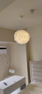 A fluffy white pendant light fixture installed by Electrician on Call and Home Service in Taguig, PH.