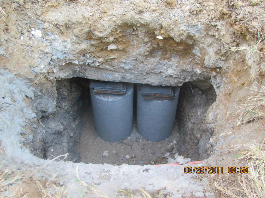 Concrete foundation piers installed in an excavated trench by Metro-Tex Foundation in Plano, TX