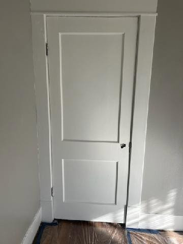 A freshly painted white interior door and trim, showcasing painting services by Joel's flooring & Handyman services in Roy, UT.