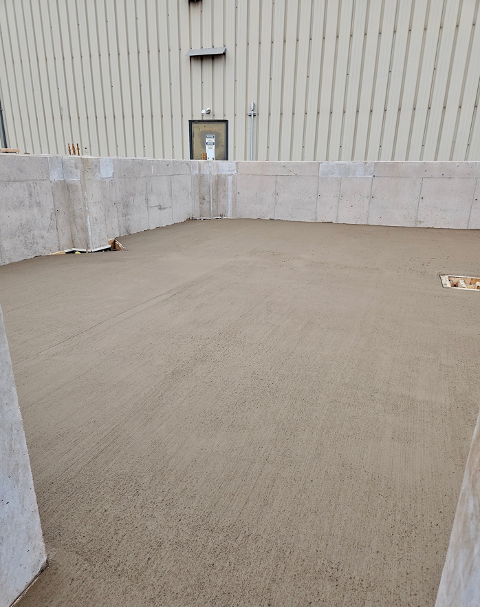 A freshly poured concrete slab at a construction project by L.R. Costanzo Co., Inc. in Scranton, PA