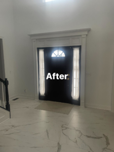 Expertly installed front door trim and new tile flooring in an entryway by Ray's construction in St. George, UT.