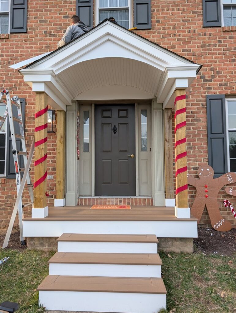 Front porch renovation in progress on a brick house by Adam's Handyman and Contracting in Lancaster, PA.