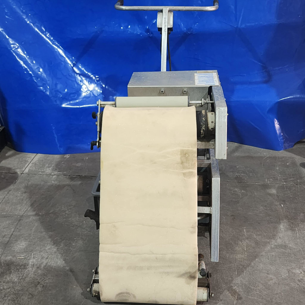 Front view of a floor preparation machine with a roller at International Flooring and Protective Coatings in Norfolk, VA.