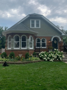 Full front view of a house with completed siding renovation by Sockett Siding, LLC in Milwaukee, WI