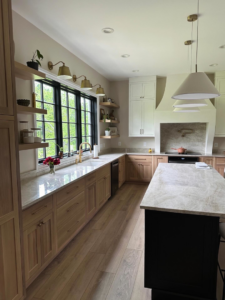 Full kitchen renovation with new cabinets, island, and lighting by Begley Development LLC in Kingsport, TN