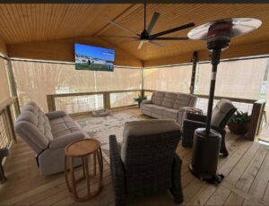 Furnished outdoor deck or porch, a completed home improvement project by Knoxville Guttering and Home Improvements in Knoxville, TN.