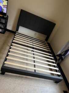 A newly assembled bed frame, showcasing furniture assembly services by JW Contracting Services, LLC in Dayton, OH.