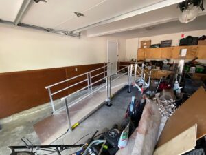 An accessibility ramp installed inside a garage by Thrive Homes, LLC in Olathe, KS.