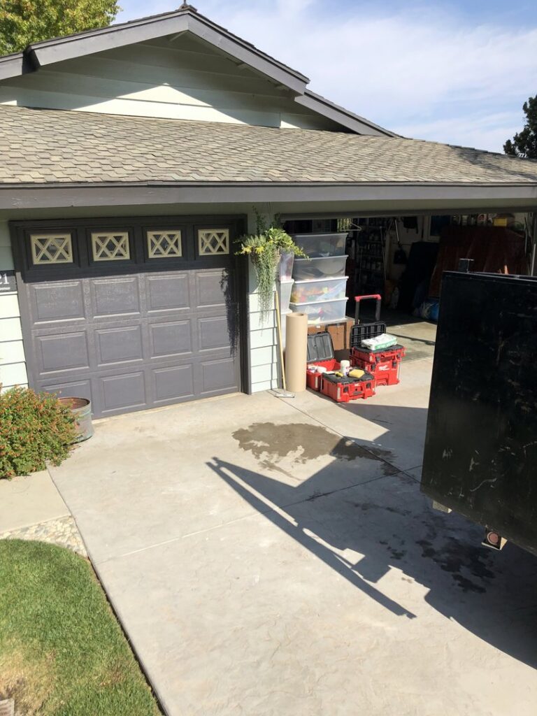 A garage filled with items ready for cleanout and junk removal by The Junk Gentlemen in Anaheim, CA.