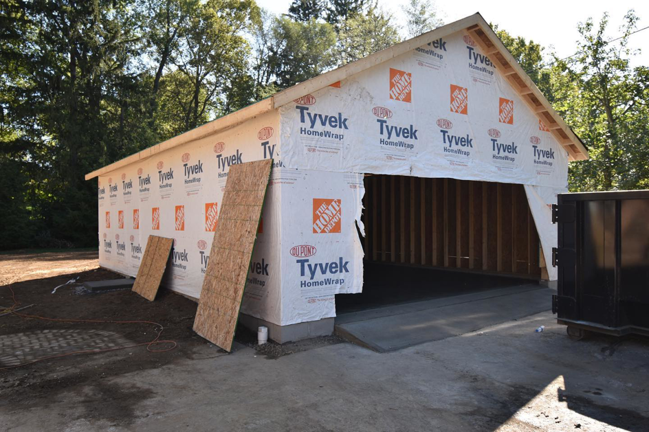 Exterior of a garage under construction, wrapped in Tyvek HomeWrap, by R4R General Contracting in Columbus, OH.