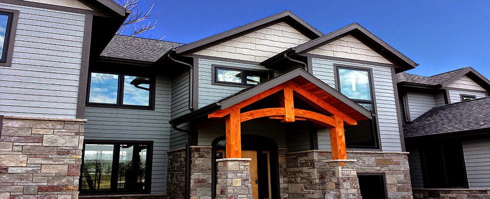 A charming gazebo with decorative copper gutters and rain chains installed by Gutter Flow7 LLC in Madison, WI.