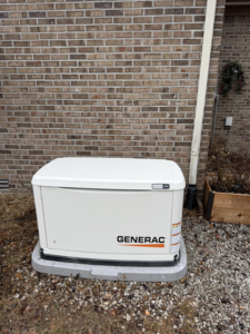 A Generac whole-house generator installed on a concrete pad by Morris Electrical Service in Hopkinsville, KY.