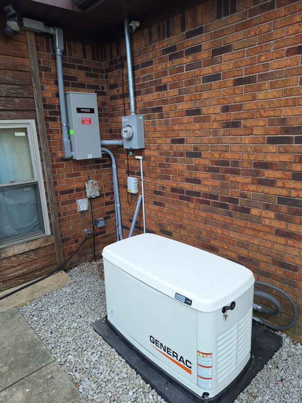 A Generac whole-house generator installation with visible electrical connections by Morris Electrical Service in Hopkinsville, KY.