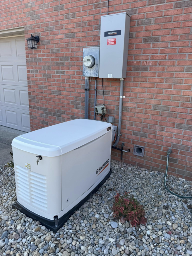A Generac whole-house generator installed outside a brick home by Morris Electrical Service in Hopkinsville, KY.