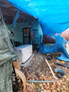 A new generator being installed under a covered area by Sir Fix-A-Lot Handyman Services, LLC in Palmer, AK.