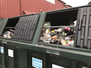 A large dumpster specifically for glass recycling at Windham Solid Waste Management District in Brattleboro, VT.