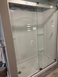 A modern glass shower enclosure newly installed by Triple M Handyman in Portsmouth, NH.
