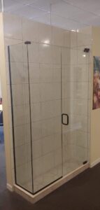 Glass shower enclosure with tiled walls installed by Thermal Concepts, Inc in St. Louis, MO.