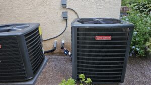 Two Goodman outdoor AC units installed at a property by Medina's Handyman LLC in Las Vegas, NV