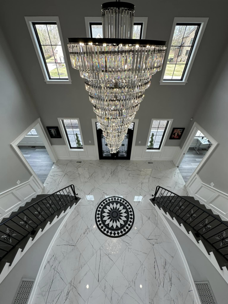 A grand foyer with a beautifully tiled floor installation completed by A&L Tile LLC in San Diego, CA