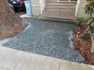 A newly installed gravel pathway leading to a home entrance by Barry's Handyman Service in San Diego, CA.
