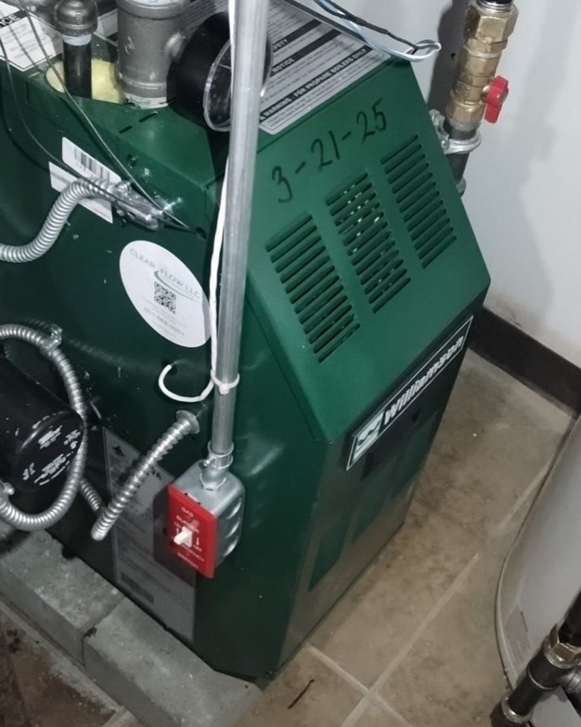 A green Williamson boiler heating system installed by Clear Flow Plumbing, Heating, and Hvac Contractors LLC in Jersey City, NJ