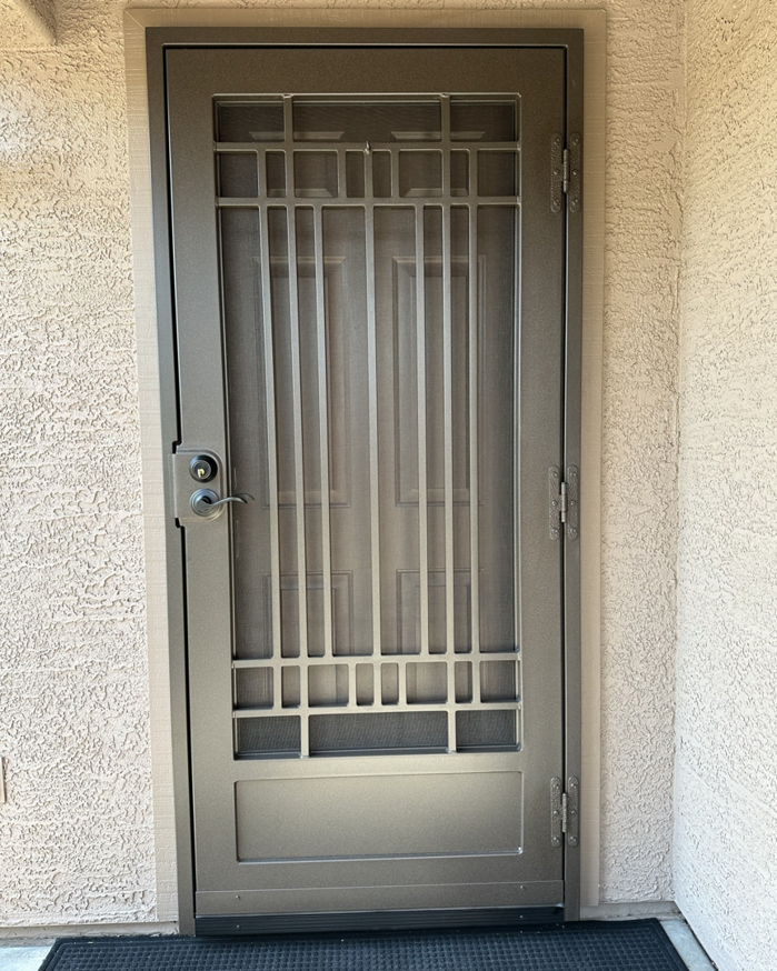 Security screen door with a grid pattern installed by Steel Creations & Fabrication, INC in Glendale, AZ