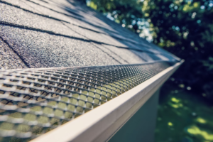 A close-up view of a newly installed gutter guard on a roof, a handyman service by ACE Roofing & Construction in Ruskin, FL