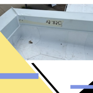 Close-up of a white gutter needing repair or cleaning by JCR Construction LLC in Everett, WA.