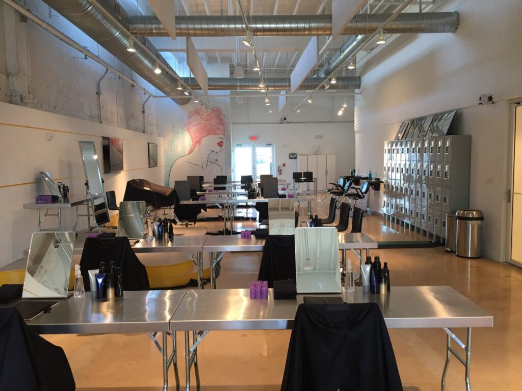 The spacious interior of a modern hair salon or beauty school build-out by Madison Construction Group, Inc. in Miami, FL
