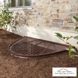 Hands installing a new gutter system on a house, showcasing handyman services by Advanced Construction of Janesville LLC in Janesville, WI.