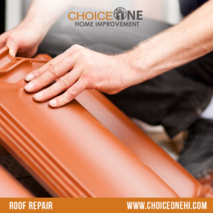 Hands installing new terracotta roof tiles during a repair project by Choice One in Miami, FL