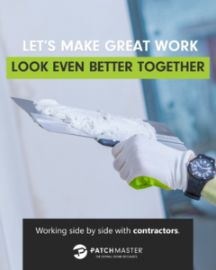 A handyman's gloved hand holding a drywall knife with joint compound, ready for application by PatchMaster Saint Charles County in O'Fallon, MO.